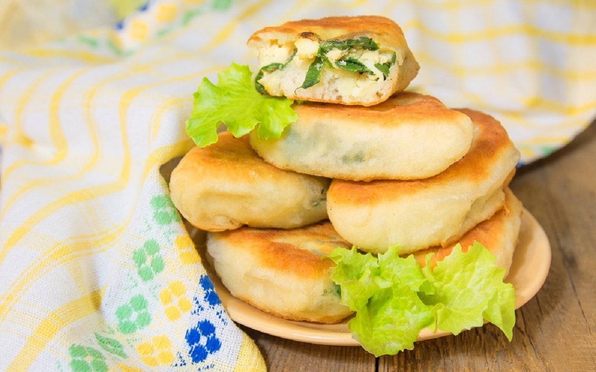 Как приготовить Пирожки с зеленым луком и яйцом в духовке рецепт пошагово